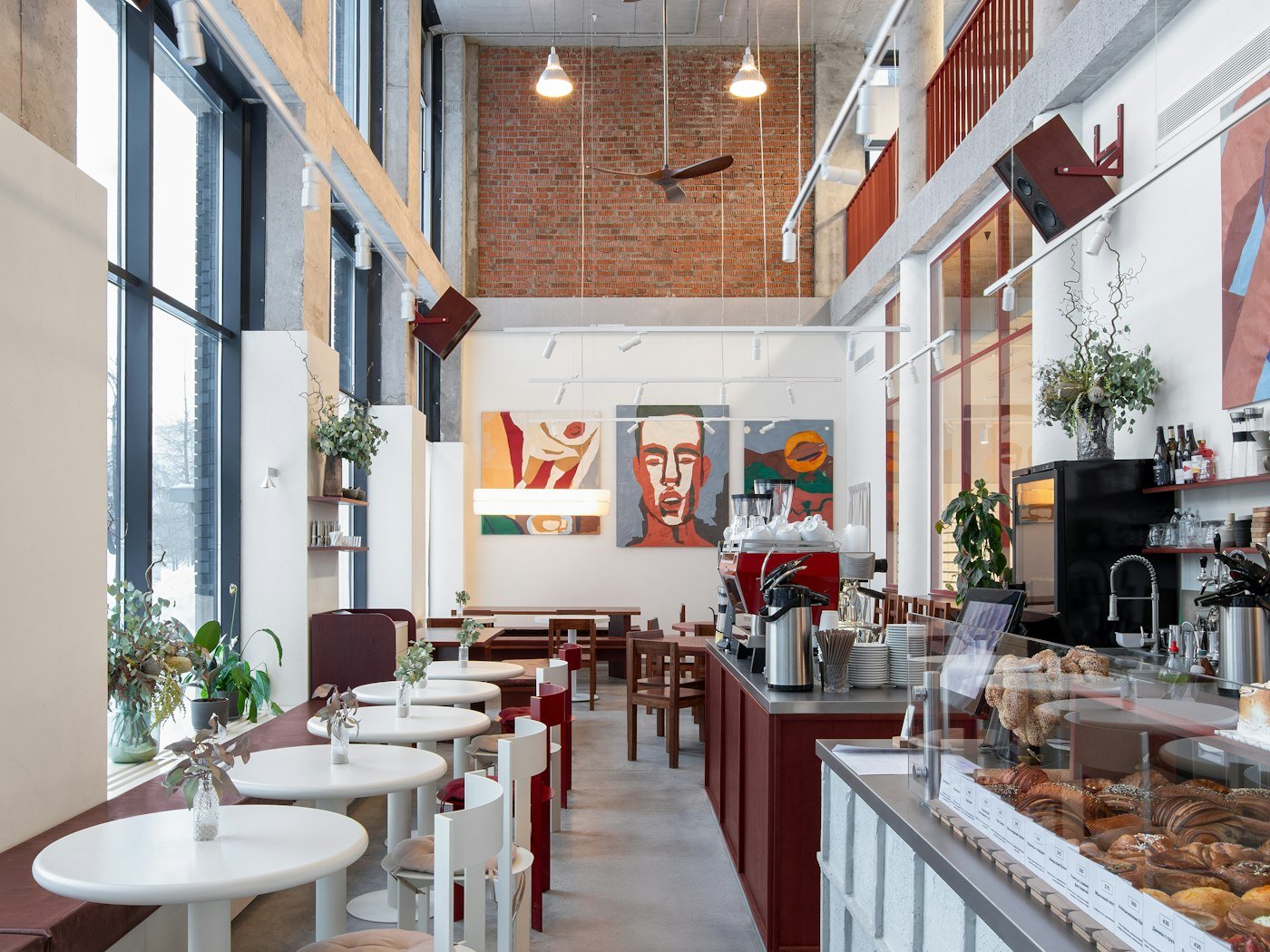 Representative café interior with seating and a service counter